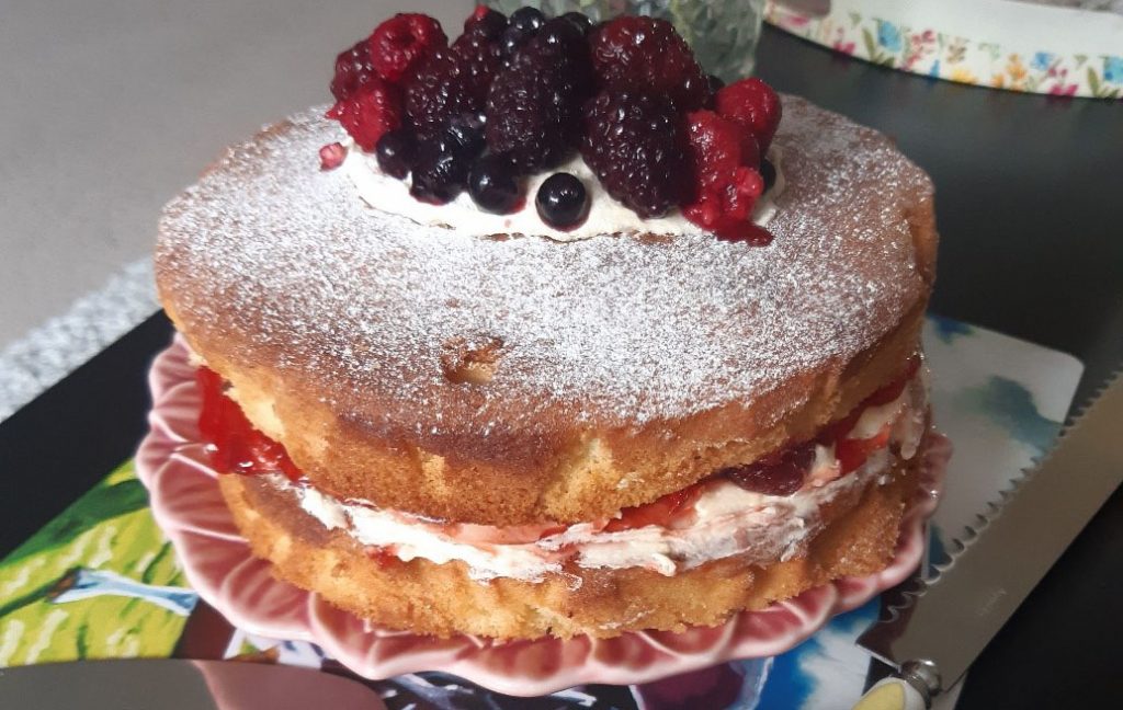 A Victoria sponge with berries on top