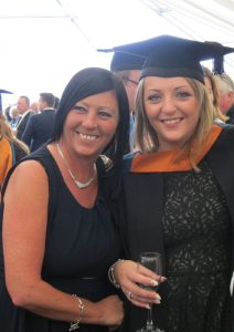 A mum and her daughter at university graduation