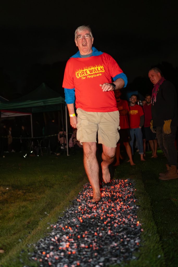 A man walking on hot coals