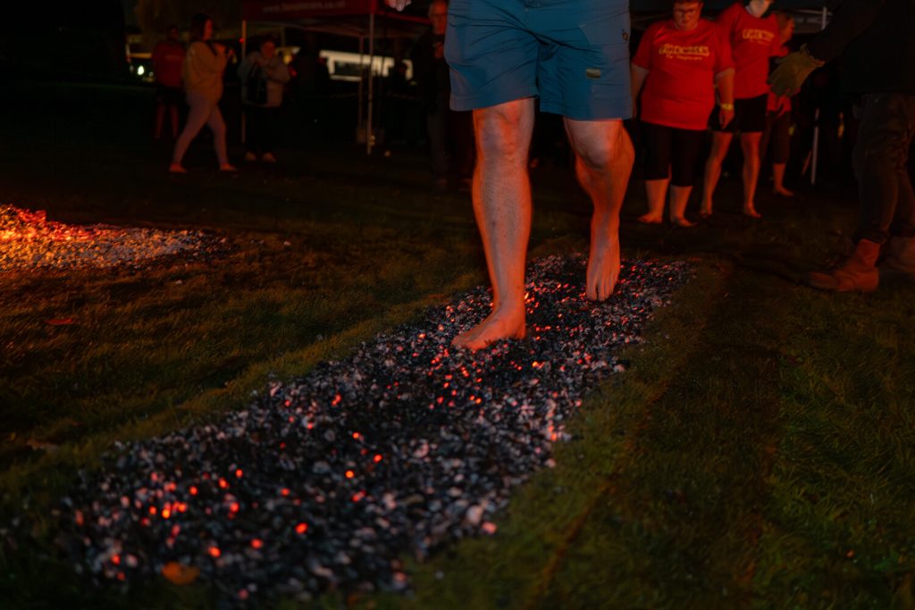 A man walking on hot coals