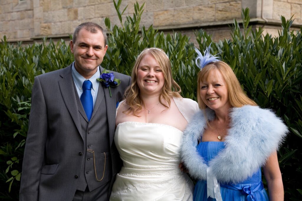 Sarah on her wedding day with Mike and Rachel