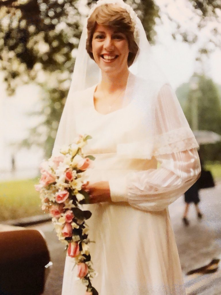 A woman in a wedding dress in the 80s